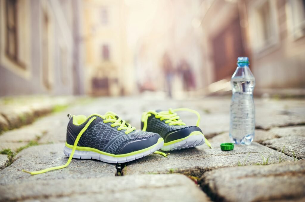 Running shoes and bottle of water